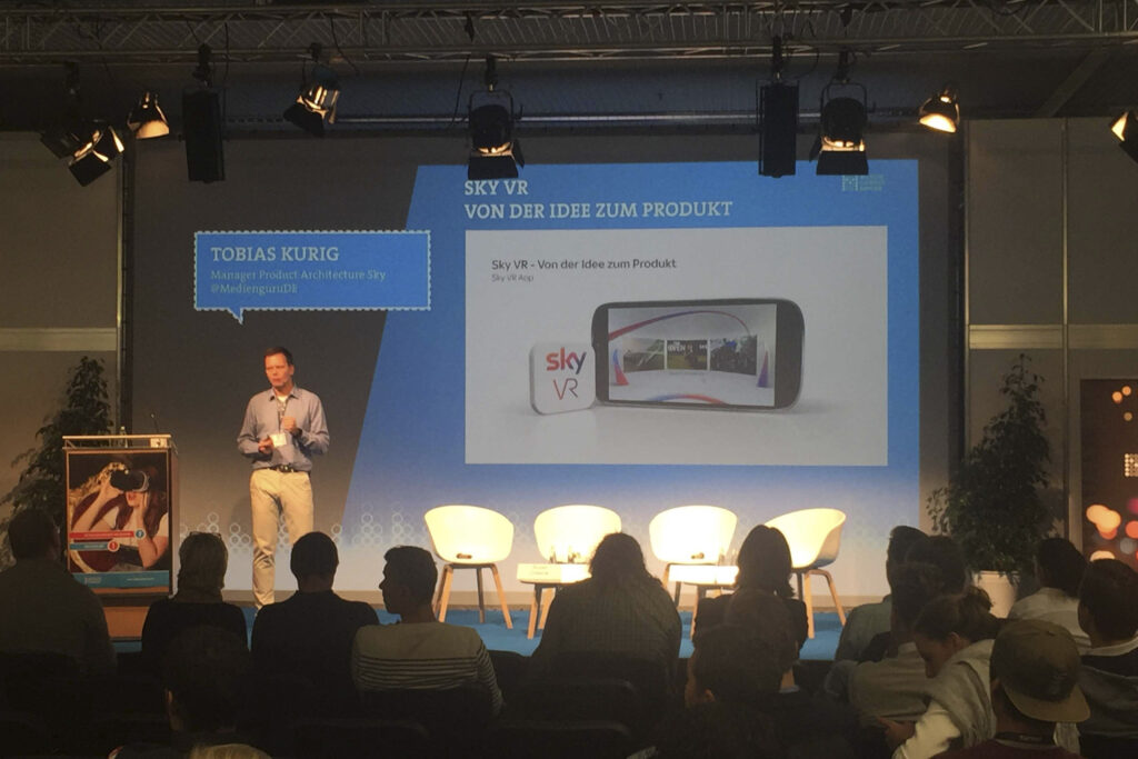 Vortrag von Tobias Kurig zur Entwicklung und Umsetzung der Sky VR-App bei den Medientagen München.